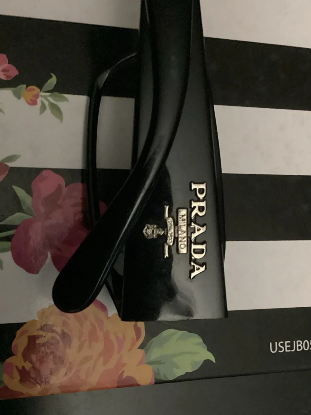 Prada Black Rectangular Eyewear with Subtle Gloss